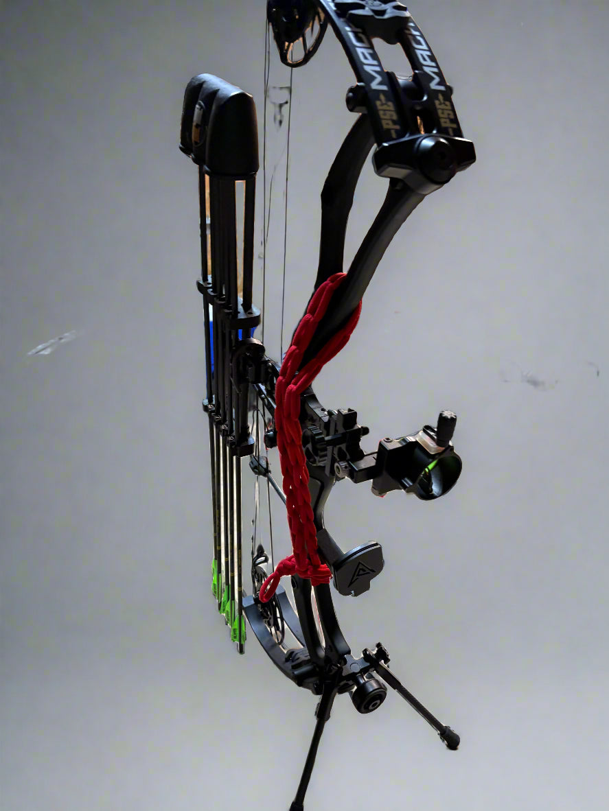bow with red vsling on a stand with a blurred background