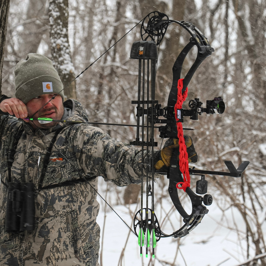 Vsling bow sling installed on a Mathews compound bow for hands-free bowhunting carry.