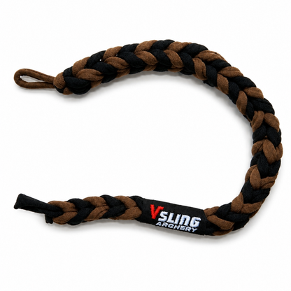 Turkey hunter in camouflage with Vsling® bow sling and harvested turkey