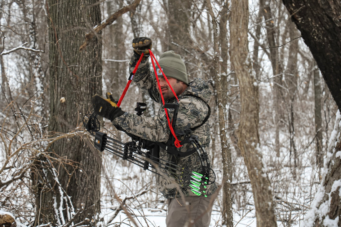 Vsling bow sling installed on a Mathews compound bow for hands-free bowhunting carry.