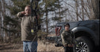 Man and child shooting bow and arrow with Vsling